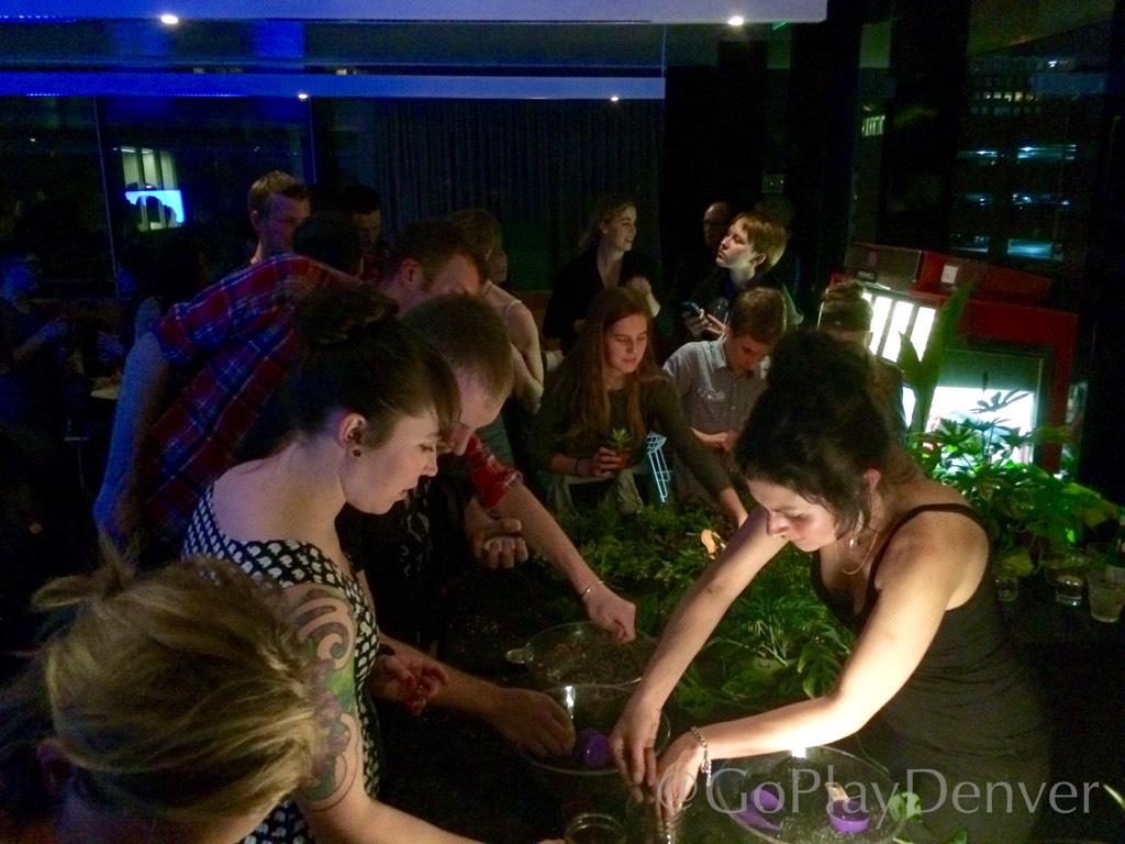 Guests create alien-themed terrariums during a Black Sheep Friday event at the MCA.