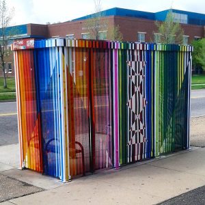 Bus shelter painted by Birdseed Collective. Image by @KobeAnDenver via Twitter