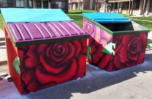 Dumpsters painted by Thomas as part of a P.S. You Are Here Grant project in Sunnyside.