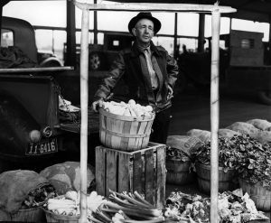 A produce vendor at Denargo Market circa 1939.