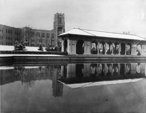 The former pavilion at the Sunken Gardens Park with West High School in the background. Image courtesy Stephen H. Hart Library & Research Center, History Colorado.