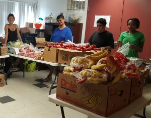 Volunteers at the Birdseed Collective Food Program at the Globeville Rec Center. Antonia is second from the right. Image courtesy Birdseed Collective.