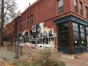 The exterior of Z Cuisine (temporarily closed) at 30th & Wyandot features a wheat paste photography gallery by artist Mark Sink. Image: Tara Bardeen