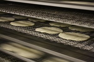 Fresh tortillas being made at Tortillas Mexico. Image courtesy Tortillas Mexico